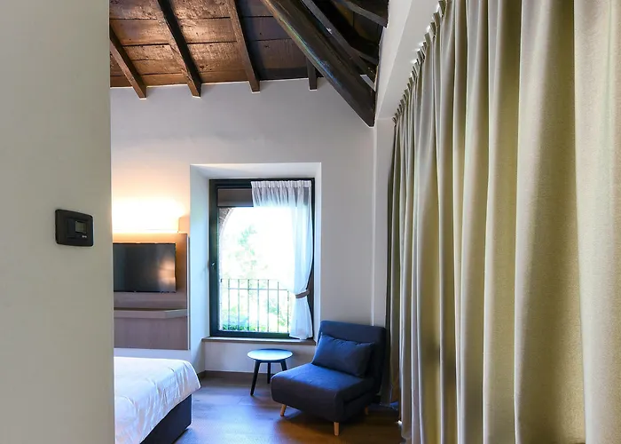 Relais & Castello Di Casiglio Эрба