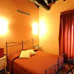 Relais & Castello Di Casiglio Hotel 4*